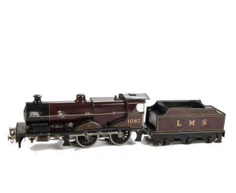 A Bassett-Lowke 0 Gauge 3-rail ‘Compound’ Locomotive and Tender: in LMS lined maroon livery as no 1082, overall F, front bogi