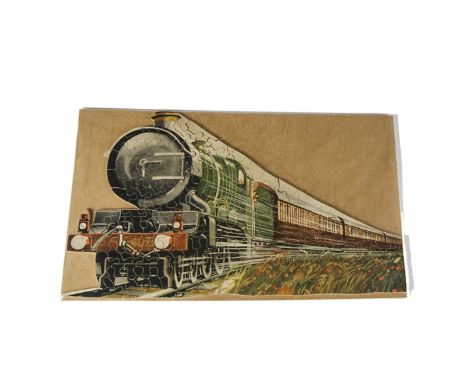 A Chad Valley GWR shaped Jigsaw ‘Speed’, showing Caerphilly Castle hauling an express train, this version without lamp bracke