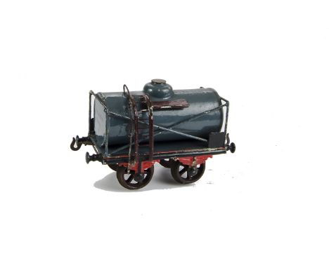 An early Bing Gauge I Tank Wagon: circa 1902, ref 9176/1, with blue-grey tank, black/red underframe, soldered construction in