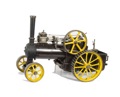 A 1½” scale coal-fired Live Steam single-cylinder traction engine: painted in deep maroon and yellow, with pressure gauge, re