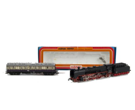 A Märklin Hamo H0 Gauge 2-8-2 Locomotive and Fleischmann Coach: for 2-rail operation, the locomotive in DB black as no 41 334