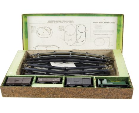 A Leeds Model Company post-war 0 Gauge Electric Train Set, comprising Southern green 0-4-0 Tank Engine, GW Van, LMS Van and O