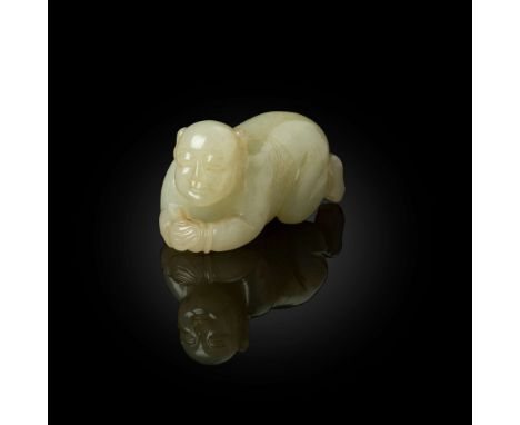  CHINESE WHITE JADE CARVING 'BABE' BRUST REST QING DYNASTY, 19TH CENTURY 清 白玉雕臥嬰型筆擱the recumbent babe with two hands holding 