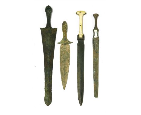 Antiquities: four bronze daggers, including one Luristan and one Elamite period, 26 to 38cm (4)