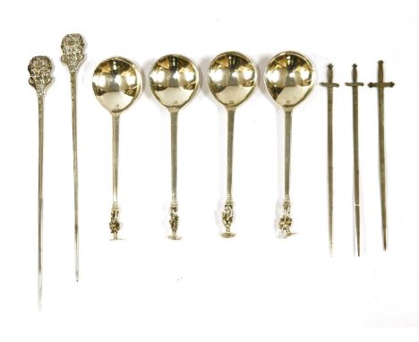 Mixed silver flatware, comprising: a set of four St Peter terminal spoons, each stamped 'W', a pair of Continental skewers, w