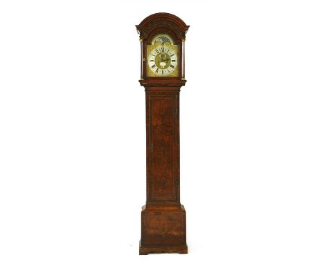 A George III walnut longcase clock, by Jonas Thorlet, London, with an arched 12in dial, silvered chapter ring, moonphase with