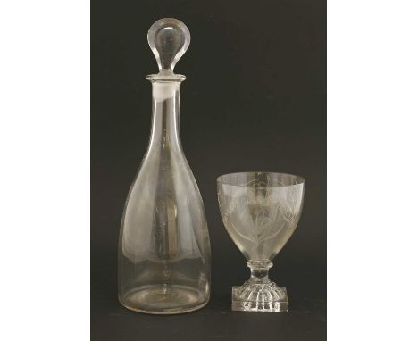 A glass decanter, c.1790, of plain form with polished bullseye stopper, 30cm high, together with a rummer , c.1790, with lemo