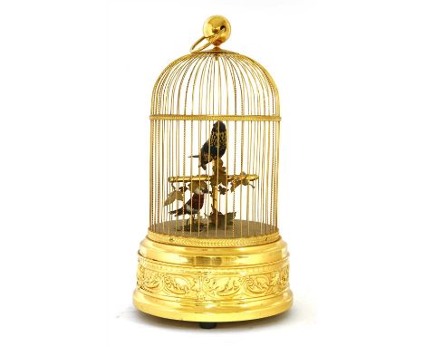 A Reuge musical birdcage automaton, mid-20th century , the domed cage with two singing feathered birds inside, on a pierced l