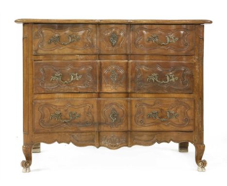 A French walnut serpentine front commode, late 19th century, the moulded top over three graduated drawers, each with carved s