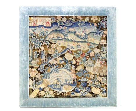 A tapestry panel, 17th century, with figures and animals in a rustic setting, 66cm wide 61cm high, in a blue velvet frame
