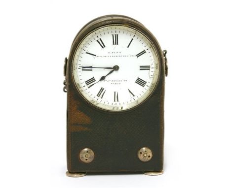 A French brown leather cased travelling clock, the white enamel dial with Roman numerals, inscribed 'E.Fitt de la Marine de L