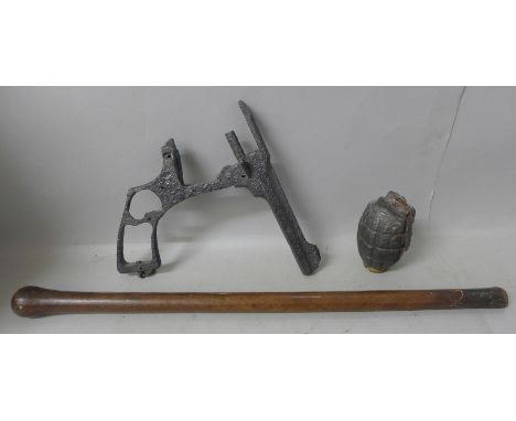 An Officer's swagger stick, a grenade and revolver recovered from trenches 