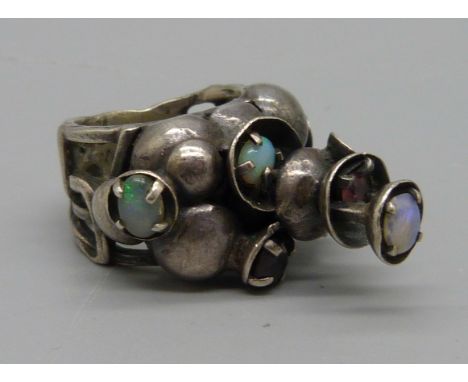 A vintage Rachel Gera opal and garnet silver ring 