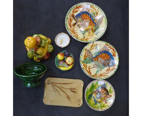 Three Continental plates decorated with fish, a ceramic bowl of fruit, bread board, etc. 