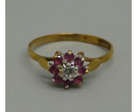 A 9ct gold ruby and white stone cluster ring, 1.2g, size N 