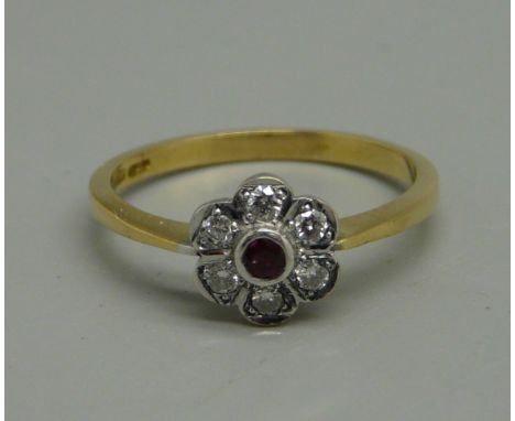 An Art Deco 18ct gold, ruby and diamond cluster ring, 2.9g, size P 