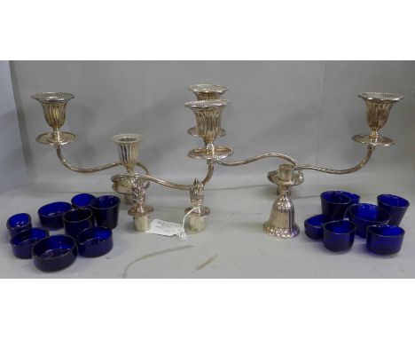 A Sheffield plate candelabra with no base and a collection of blue glass liners 