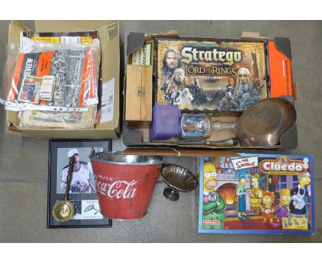 A Simpsons Cluedo board game, a ship in a bottle, a Coca-Cola ice bucket, a Lord of The Rings board game, two items of plated