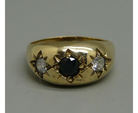 A 9ct gold, garnet and white stone gypsy ring, 4.4g, size R/S 