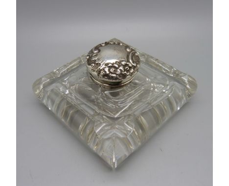A silver topped glass inkwell/paper weight, Chester 1900 