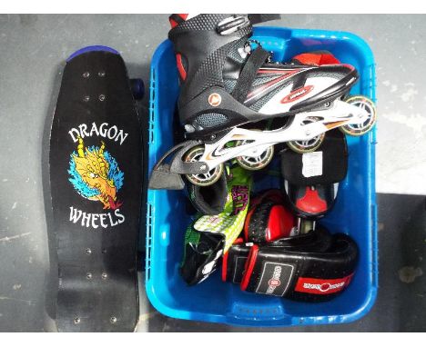 A good mixed lot to include Dragon Wheels Skateboard, adult roller boots size 10, children's skates size 5-8, Martial Arts bo