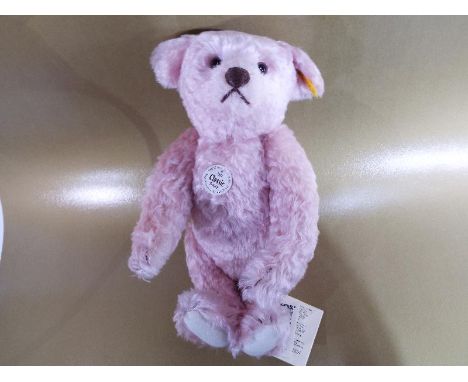 Steiff - '1907 Classic Teddy Bear' replica, button in ear with yellow tag label, other tag labels, pink mohair, 35 cm (high) 