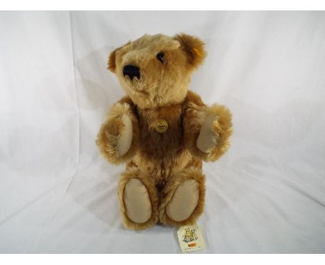Steiff - '1903 Classic Teddy Bear' replica, long snout, button in ear with yellow tag label, other tag labels, mohair, 55cm (