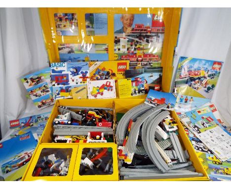 Lego - a Legoland box 6399 containing a large quantity of Lego with instruction manual and a further quantity of Lego manuals