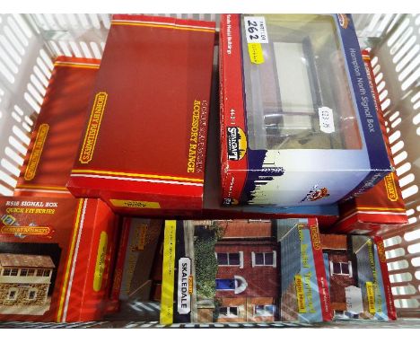 Model railways - a quantity of boxed OO gauge Hornby scenics to include water tower R520, signal box R518, low relief terrace