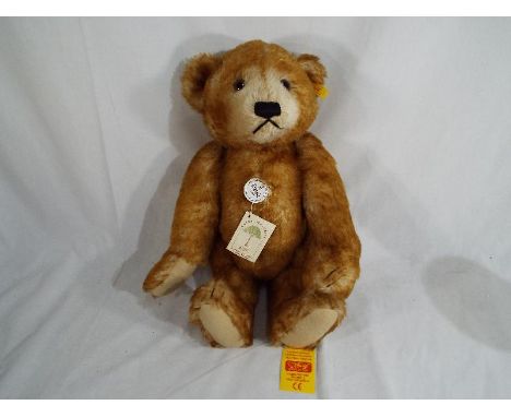 Steiff - '1928 Classic Petsy Teddy Bear' replica, with growler, button in ear with yellow tag label, other tag labels, mohair