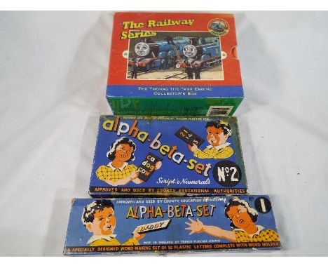 Two sets of vintage Tresco Alpha-Beta-Set word making games, Sets No 1 and No.2 included in the lot is a set of six Thomas Th