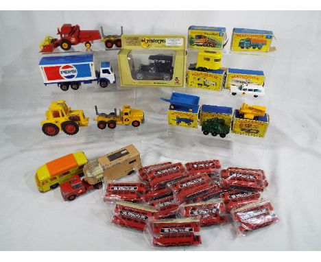 Matchbox by Lesney - a mixed lot of diecast models to include Matchbox Caterpillar Tractor # 8, Hay Trailer # 40, Pony Traile
