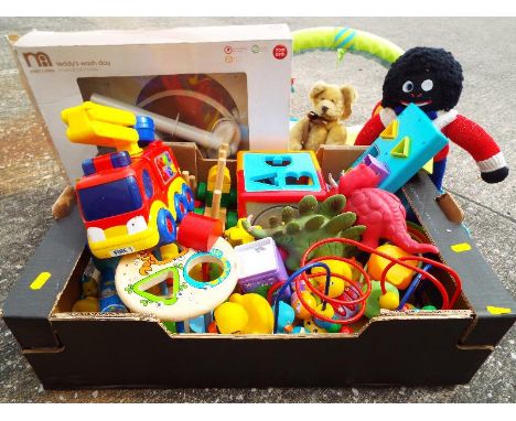 A box containing soft toys, Early Learning wooden block and plastic toys, Early learning fire engine, Blossom Farm child's pl