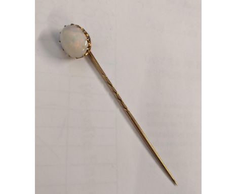 A gold coloured stick pin set with an opal, 2.3gLocation: 