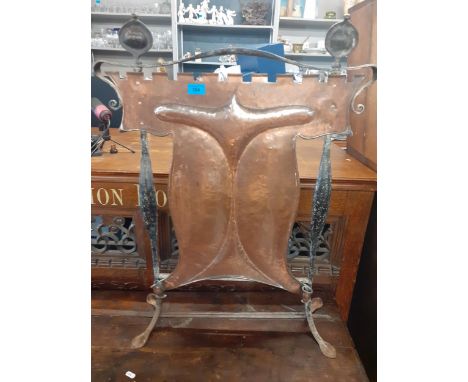 An Arts &amp; Crafts copper fire screen 82cm h Location: Rostrum 