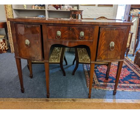 An early 20th century mahogany Regency inspired bow fronted sideboard having a single drawer flanked by two cupboard doors, 9