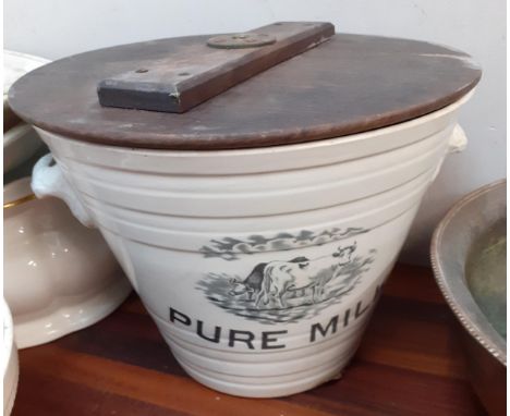 An early 20th century white ceramic pure milk twin handled pail, mixed planters to include a pink glazed Art Nouveau planter,