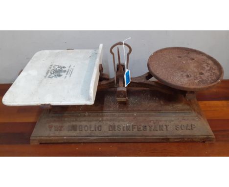 A Victorian shop scales advertising Nubolic Disinfectant Soap having a white ceramic tray inscribed W &amp; T Avery Ltd A/F L