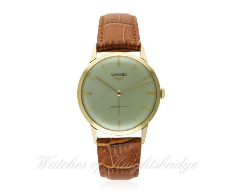 A GENTLEMAN'S 18K SOLID GOLD LONGINES WRIST WATCH CIRCA 1960s, REF. 6888 8
D: Silver dial with gilt batons, subsidiary sconds