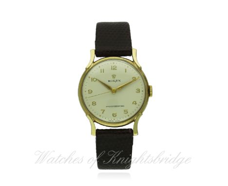 A GENTLEMAN'S 9CT SOLID GOLD ROLEX WRIST WATCH CIRCA 1950s
D: Silver dial with raised gilt Arabic numerals & "dagger" hands. 