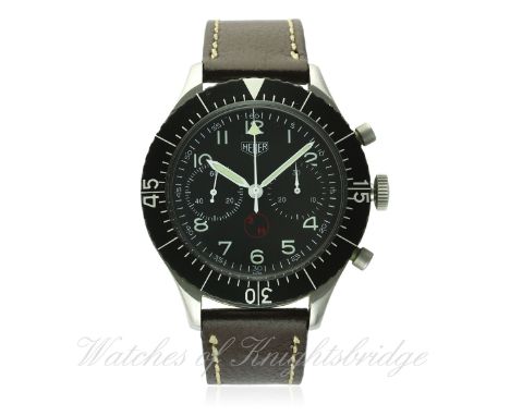 A RARE GENTLEMAN'S STAINLESS STEEL GERMAN MILITARY HEUER "BUND" FLYBACK CHRONOGRAPH WRIST WATCH CIRCA 1970
D: Black dial with