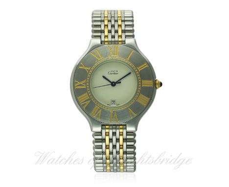 A GENTLEMAN'S STEEL &amp; GOLD CARTIER 21 "JUMBO" BRACELET WATCH CIRCA 1990s D: Silver dial with date aperture, blue steel ha