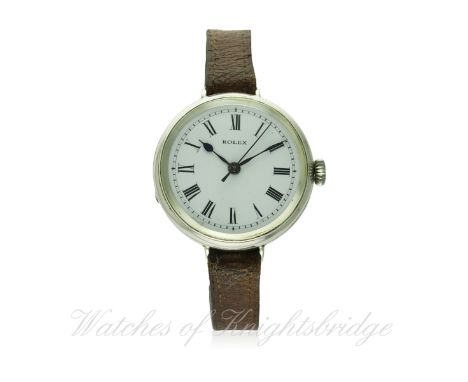 A GENTLEMAN'S SOLID SILVER ROLEX CENTRE SECONDS WRIST WATCH CIRCA 1920s
D: White enamel dial with Roman numerals. M: Manual w