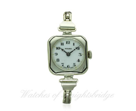 A LADIES SOLID SILVER ROLEX "CUSHION" BRACELET WATCH CIRCA 1920s
D: White enamel dial with Arabic numerals & gilt dot trackin