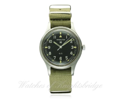 A GENTLEMAN'S STAINLESS STEEL BRITISH MILITARY HAMILTON TROPICALIZED GENERAL SERVICE WRIST WATCH REF. 75003-3 CIRCA 1960s D: 