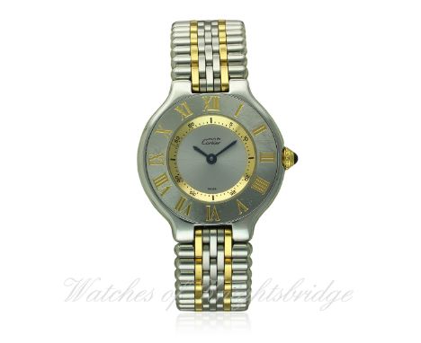 A LADIES STEEL & GOLD CARTIER 21 BRACELET WATCH CIRCA 1990s, REF 1340
D: Silver dial with gilt inner chapter ring, blue steel