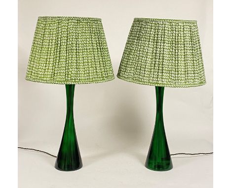 A pair of green resin table lamps, of waisted form, by Pooky Lighting, with green printed cotton gathered shades. Height of l