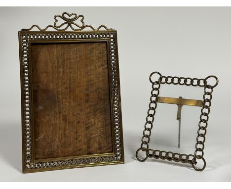 Two early 20th century brass photograph frames, each with "chainlink" frame and easel back (smaller lacking backing). (2) 33.