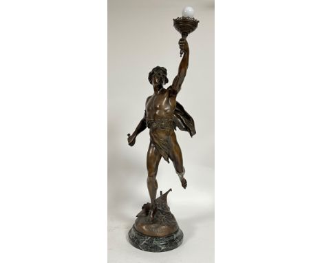 After Emile Louis Picault (1833-1915), Victoria, a bronzed metal figural lamp, on a rouge marble base, the left arm holding a