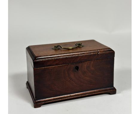 A George III mahogany tea caddy, of two divisions, of plain oblong form with bracket feet. 14cm by 24cm by 14cm